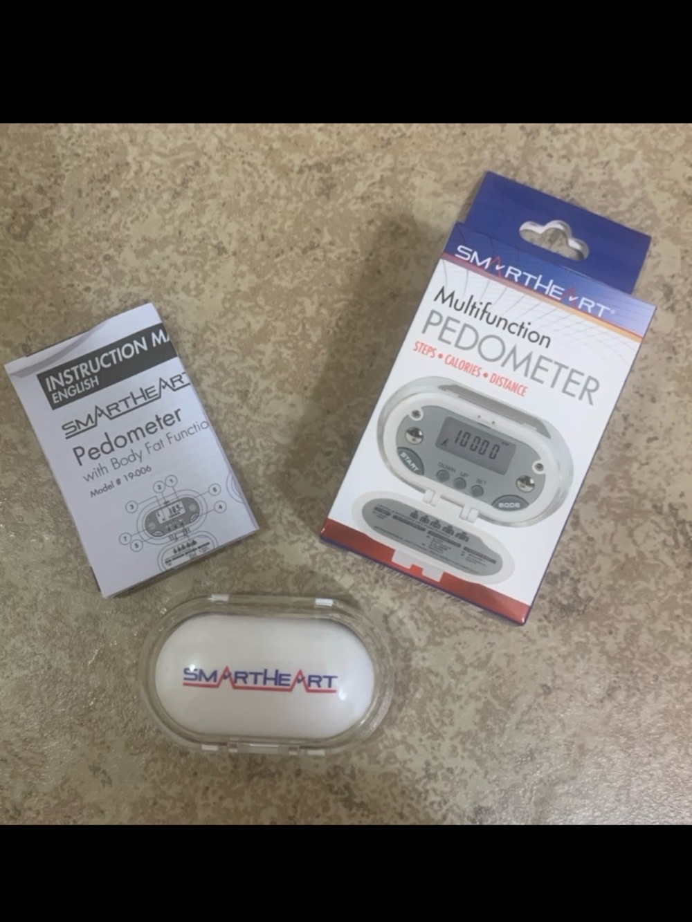 New! SmartHeart Pedometer designed to track steps, calories burned & distance.